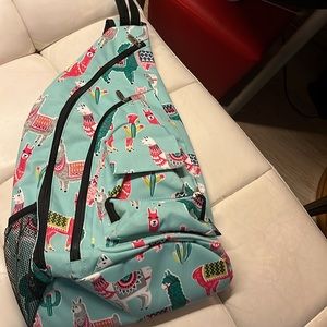 N. Gil Sling Backpack Bag